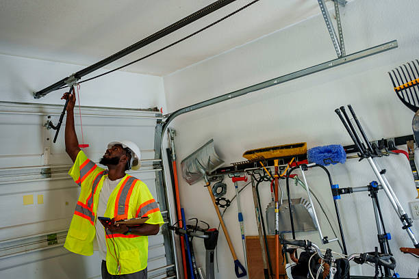 Professional Garage Door technician working in Center, TX